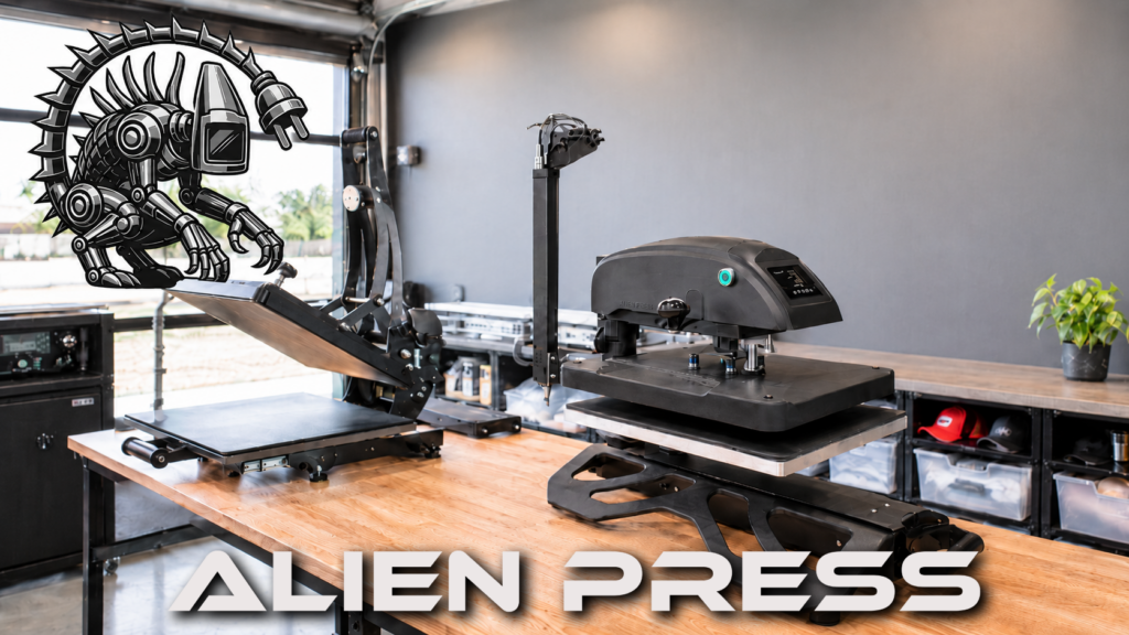 Alien Press commercial heat presses in a professional apparel printing shop